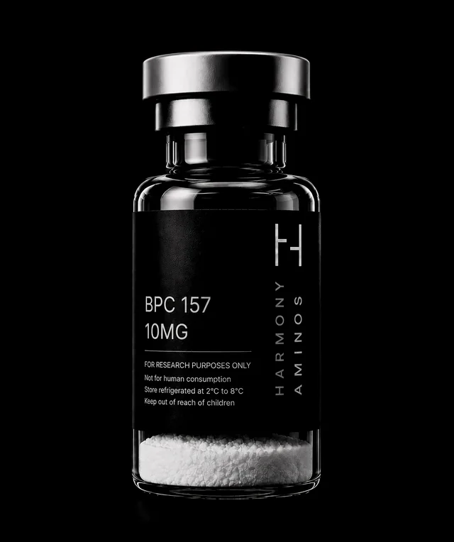 Harmony Aminos BPC-157 10 mg vial, lyophilised powder in clear glass with a black label and silver crimp cap.