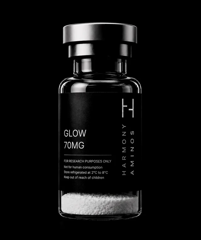 Harmony Aminos GLOW 70 mg vial, lyophilised powder in clear glass with a black label and silver crimp cap.