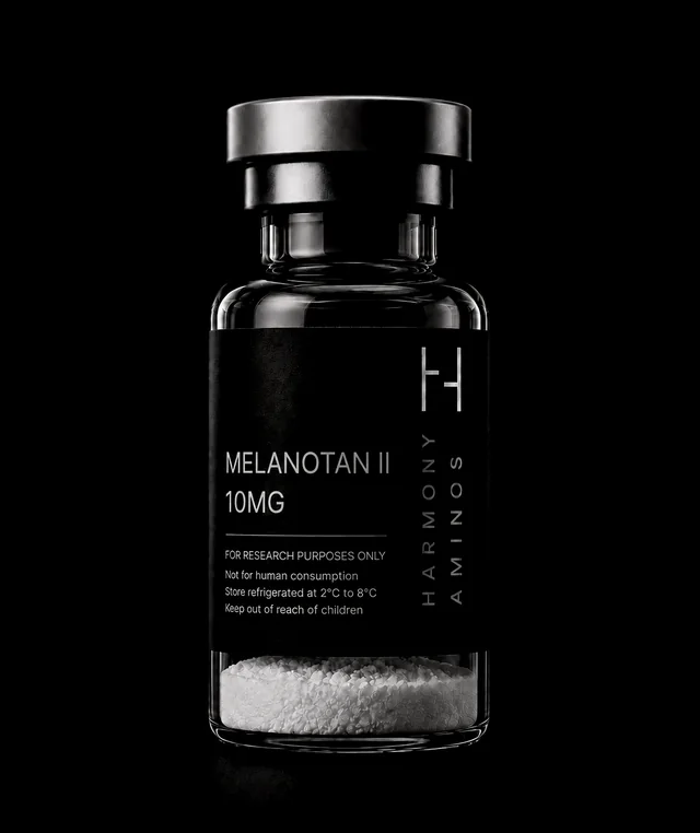 Harmony Aminos Melanotan II 10 mg vial, lyophilised powder in clear glass with a black label and silver crimp cap.
